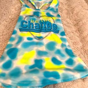 A blue and yellow tied dye tank top